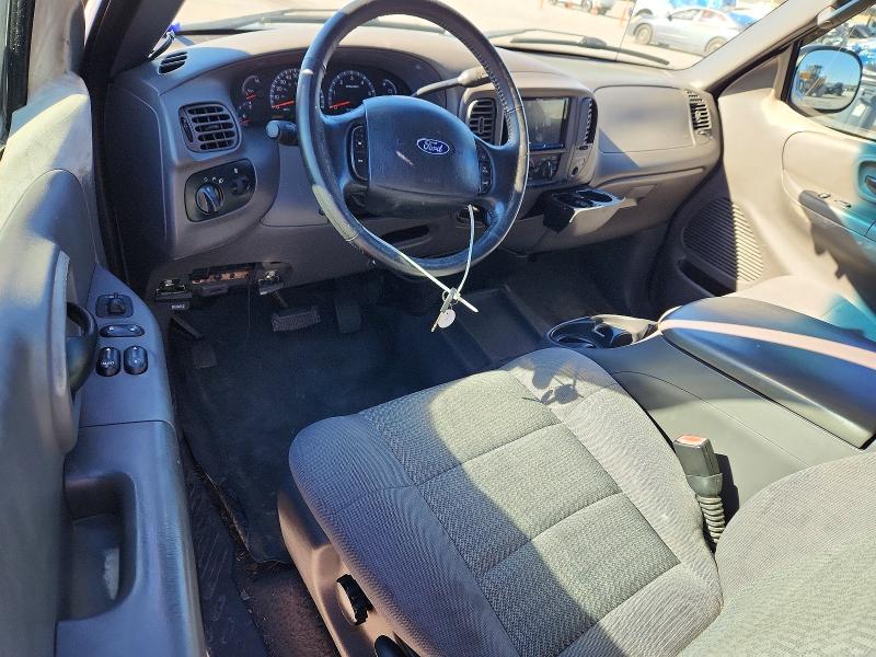 Photo 8 from auction – 2003 FORD F150 with VIN 1FTRX07W03KB95278