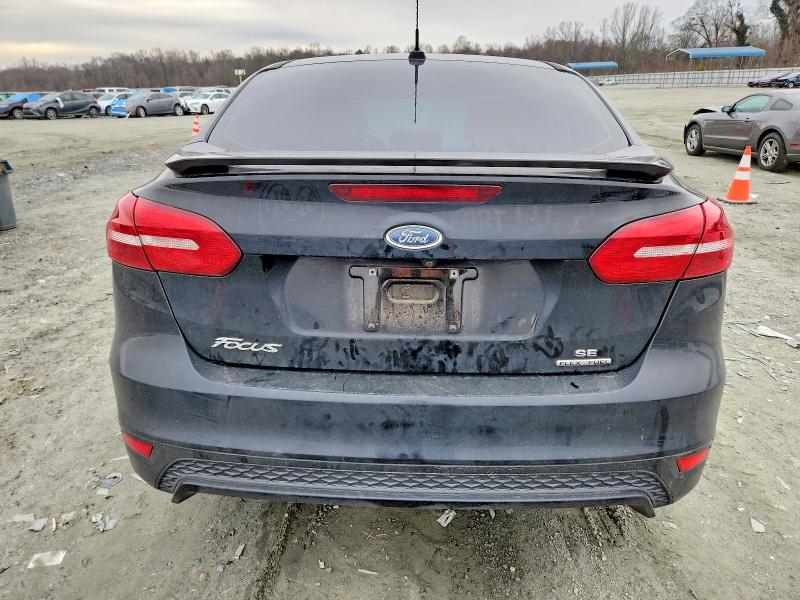 Photo 6 from auction – 2016 FORD FOCUS with VIN 1FADP3F25GL350312