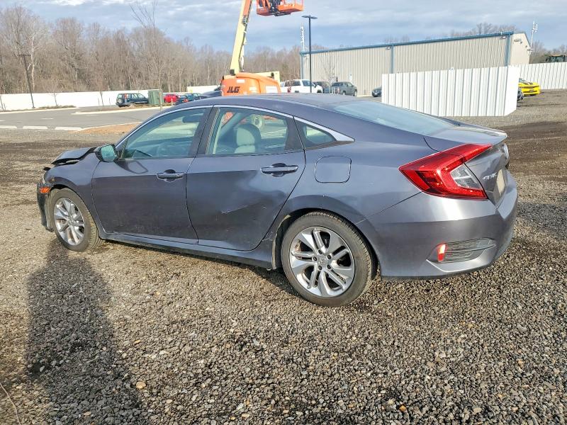 Photo 2 from auction – 2016 HONDA CIVIC with VIN 19XFC2F52GE219494