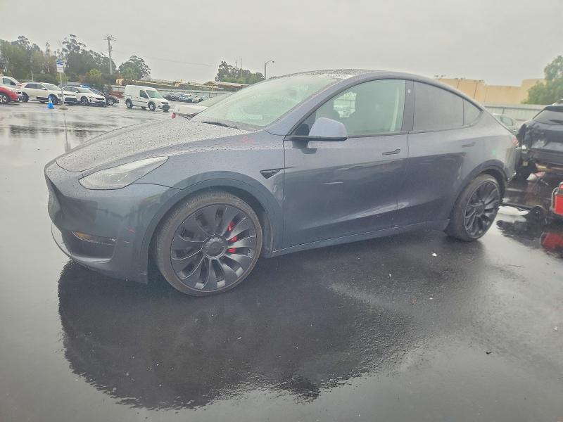 TESLA MODEL Y 2022 with VIN 7SAYGDEF6NF567957 - Photo from auction