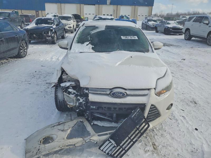 Photo 5 from auction – 2014 FORD FOCUS with VIN 1FADP3J24EL387467