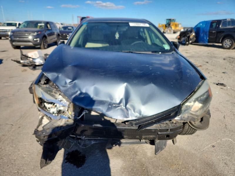 Photo 5 from auction – 2014 TOYOTA COROLLA with VIN 5YFBURHE9EP167777