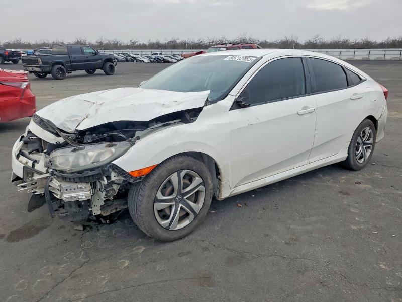 HONDA CIVIC LX 2018 with VIN 2HGFC2F69JH540194 - Photo from auction