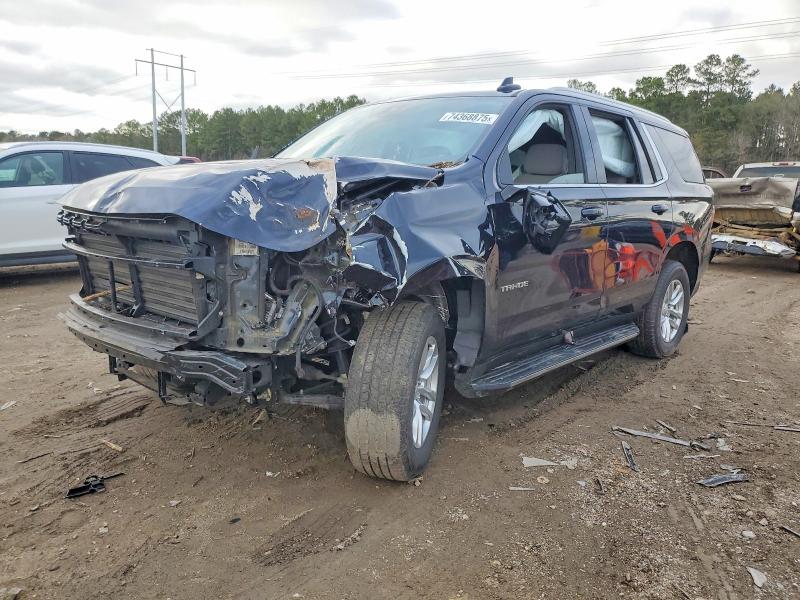 CHEVROLET TAHOE 2022 with VIN 1GNSCMKD1NR121007 - Photo from auction