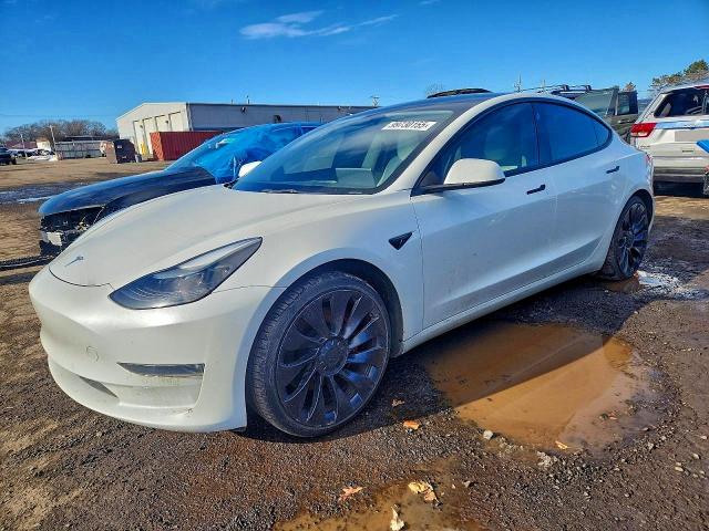 TESLA MODEL 3 2022 with VIN 5YJ3E1EC6NF192833 - Photo from auction