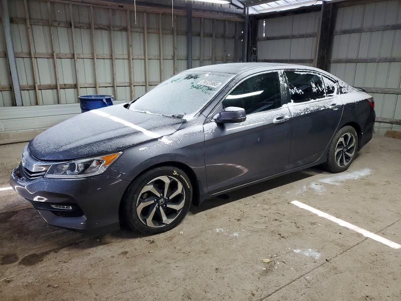 HONDA ACCORD 2016 with VIN 1HGCR2F80GA117143 - Photo from auction
