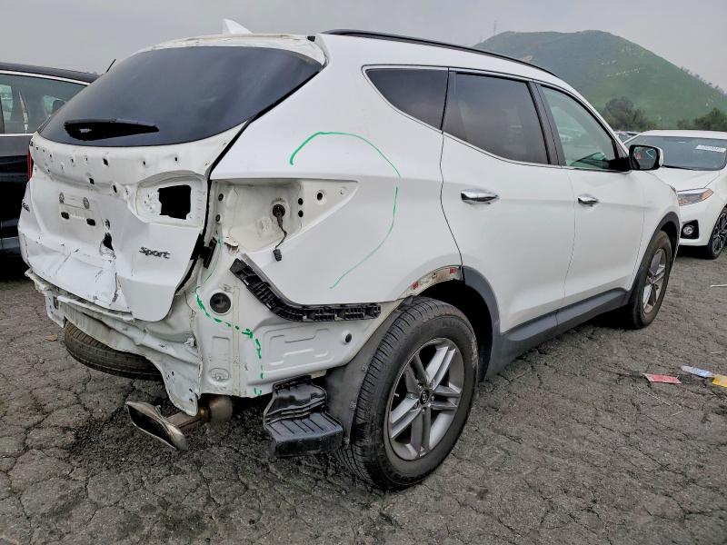 Photo 3 from auction – 2017 HYUNDAI SANTA FE S with VIN 5NMZU3LB7HH008473