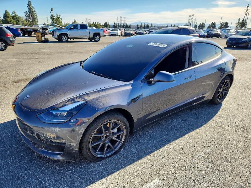 TESLA MODEL 3 2023 with VIN 5YJ3E1EA3PF606622 - Photo from auction