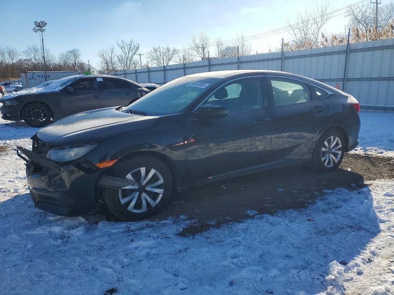 HONDA CIVIC 2018 with VIN 19XFC2F5XJE039638 - Photo from auction