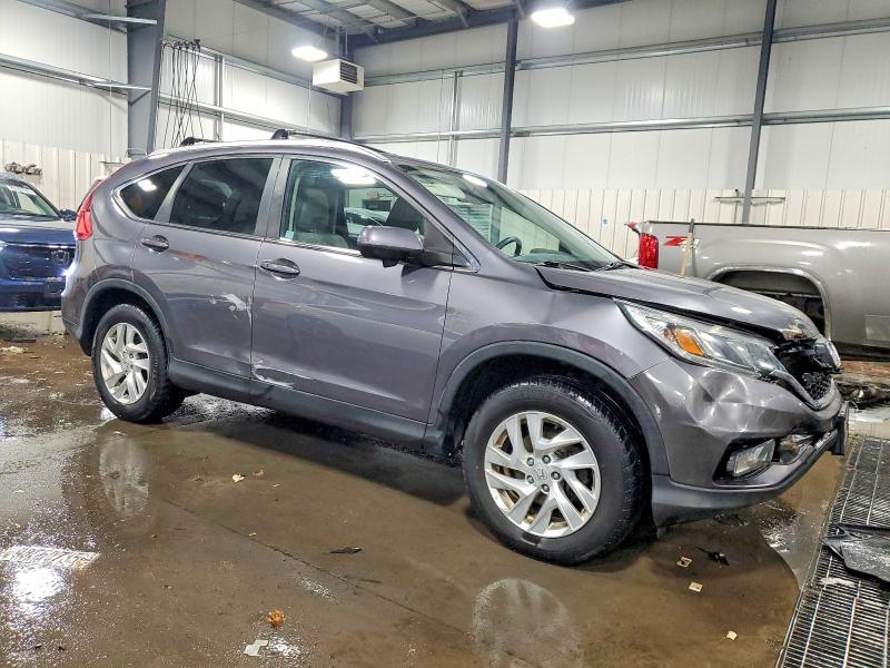 Photo 4 from auction – 2015 HONDA CR-V EXL with VIN 5J6RM4H77FL035608
