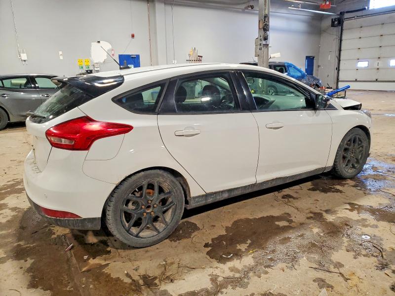 Photo 3 from auction – 2016 FORD FOCUS with VIN 1FADP3K23GL366479