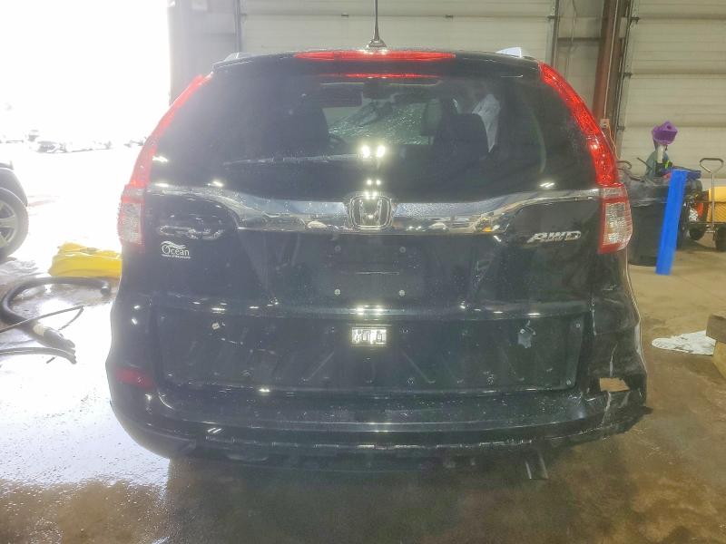 Photo 6 from auction – 2015 HONDA CR-V EXL with VIN 2HKRM4H77FH650122