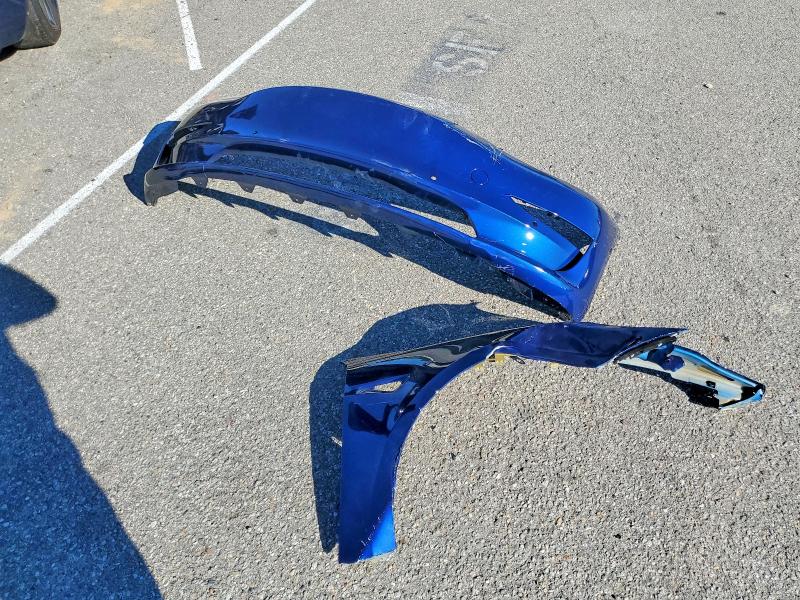 Photo 12 from auction – 2023 TESLA MODEL 3 with VIN 5YJ3E1EA9PF570354