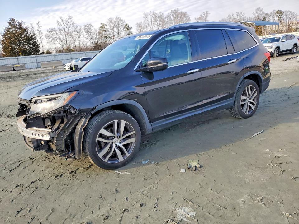 HONDA PILOT ELIT 2017 with VIN 5FNYF6H0XHB093809 - Photo from auction