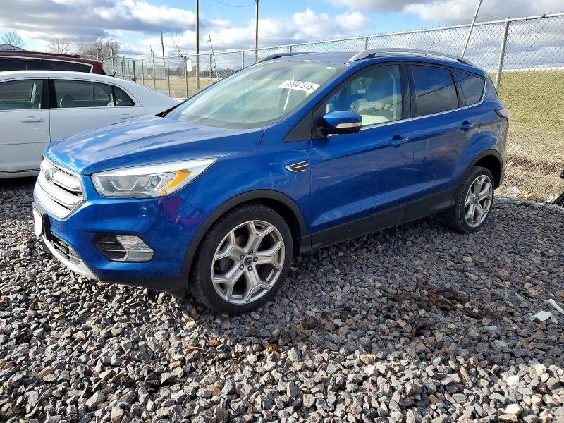 FORD ESCAPE TIT 2017 with VIN 1FMCU0JD0HUB77926 - Photo from auction