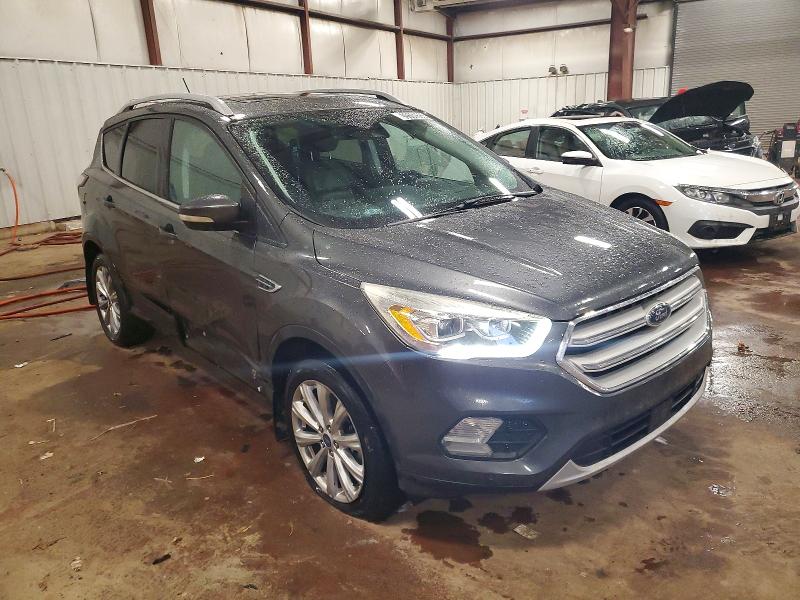 Photo 4 from auction – 2018 FORD ESCAPE with VIN 1FMCU9J96JUA41421