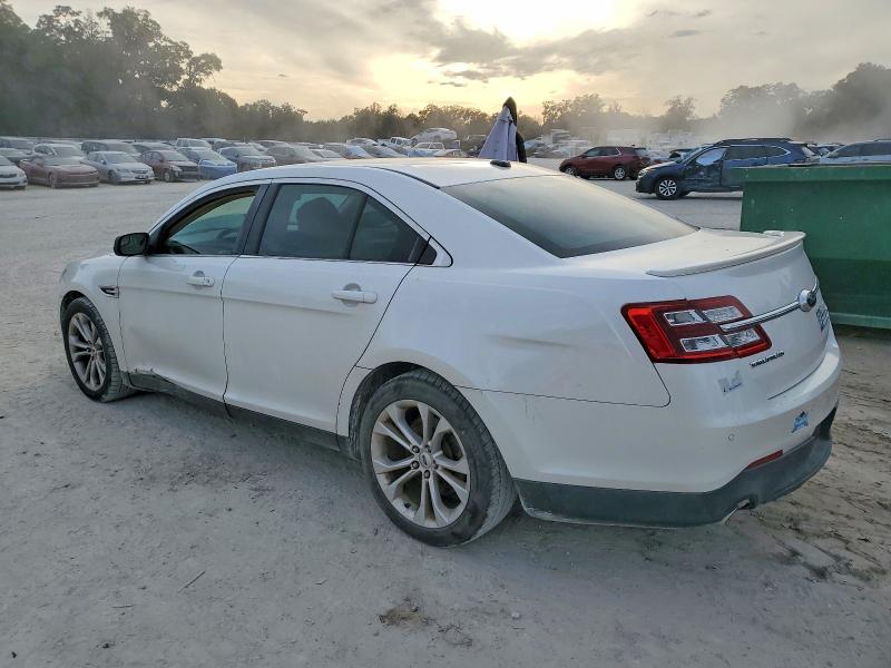 Photo 2 from auction – 2013 FORD TAURUS SEL with VIN 1FAHP2E87DG159674