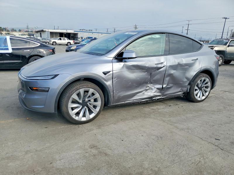 TESLA MODEL Y 2026 with VIN 7SAYGDED6TF401868 - Photo from auction
