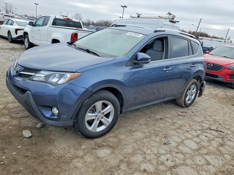 TOYOTA RAV4 2014 with VIN JTMWFREV3ED040557 - Photo from auction