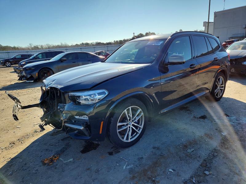 BMW X3 XDRIVEM 2018 with VIN 5UXTS3C58J0Y99710 - Photo from auction