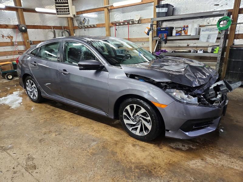 Photo 4 from auction – 2018 HONDA CIVIC EX with VIN 2HGFC2F79JH593048