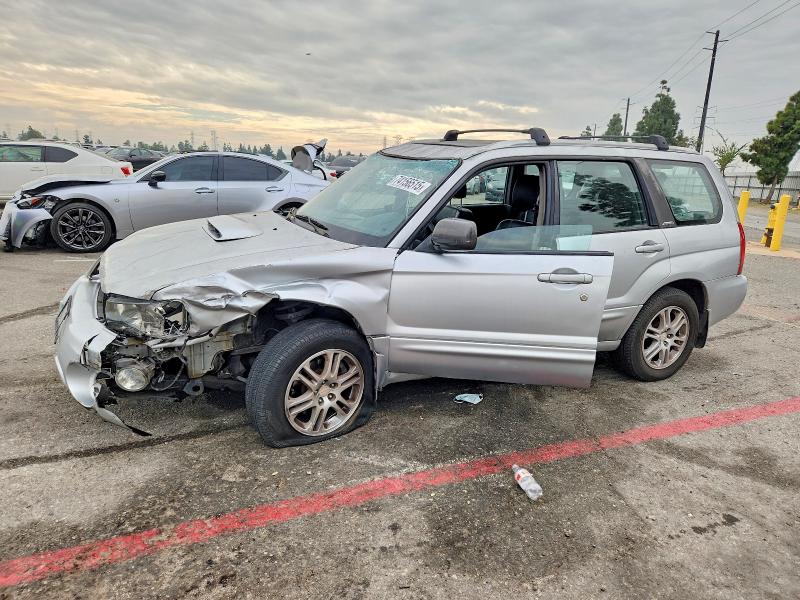SUBARU FORESTER 2004 with VIN JF1SG69604H761994 - Photo from auction