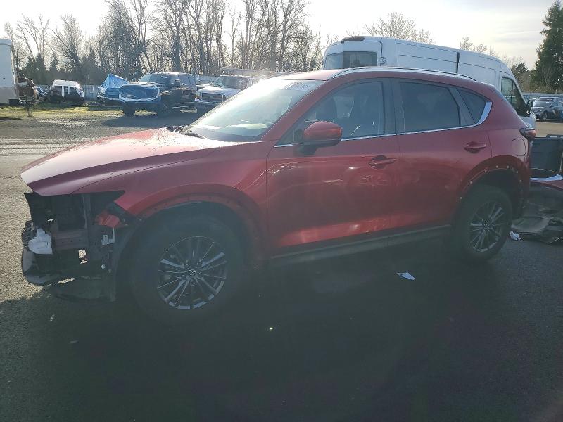 MAZDA CX-5 2021 with VIN JM3KFACM4M0303971 - Photo from auction