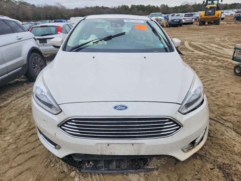 Photo 5 from auction – 2018 FORD FOCUS TITA with VIN 1FADP3J24JL220987