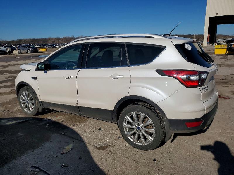 Photo 2 from auction – 2017 FORD ESCAPE TIT with VIN 1FMCU9JD5HUA38816