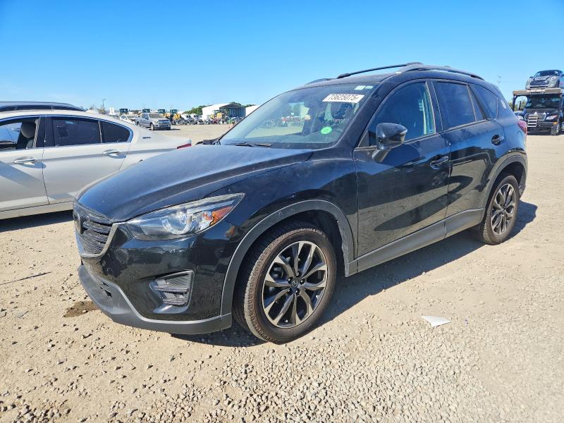 MAZDA CX-5 GT 2016 with VIN JM3KE4DY8G0675159 - Photo from auction