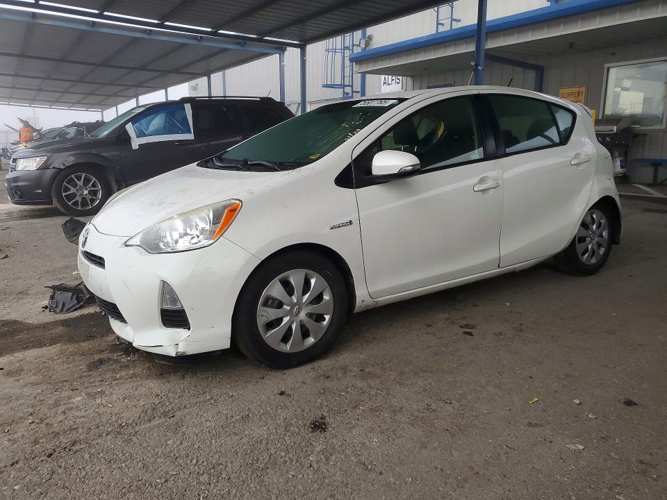 TOYOTA PRIUS C 2014 with VIN JTDKDTB34E1575127 - Photo from auction