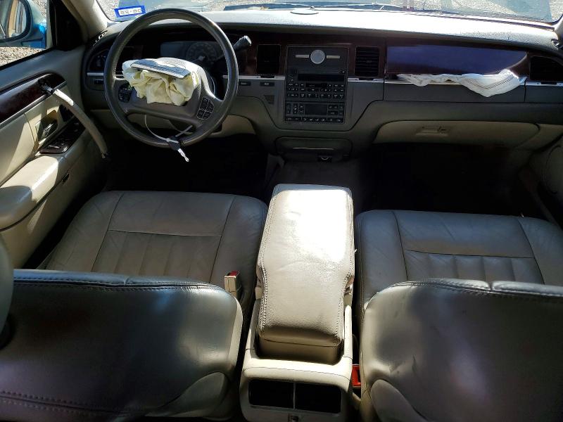 Photo 8 from auction – 2004 LINCOLN TOWN CAR E with VIN 1LNHM81W64Y684662