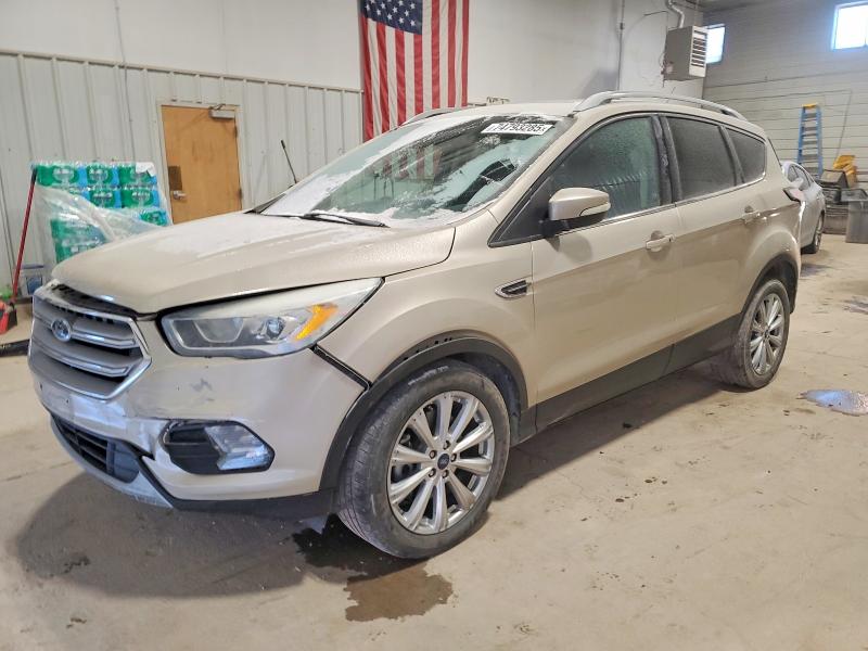 FORD ESCAPE TIT 2017 with VIN 1FMCU0J96HUD28490 - Photo from auction