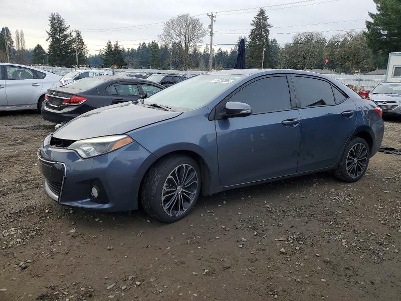 TOYOTA COROLLA L 2014 con VIN 5YFBURHEXEP078882 - Foto de la subasta