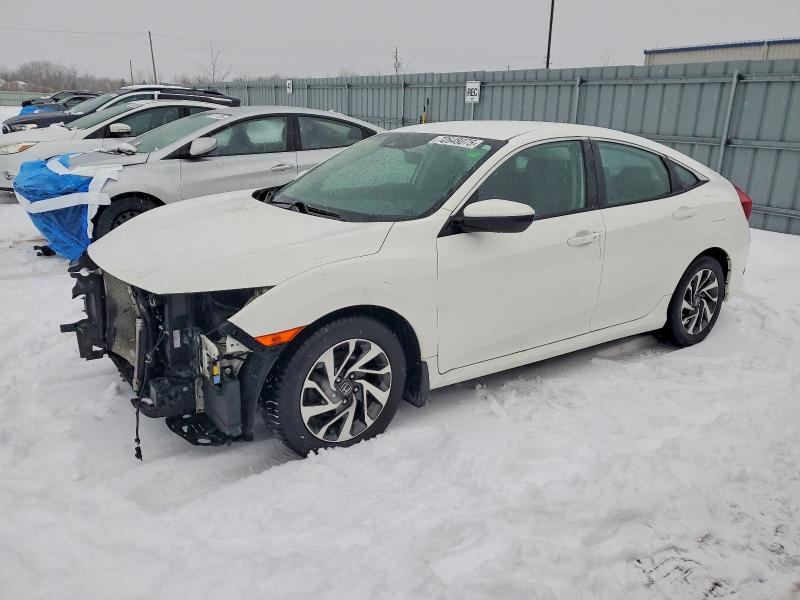 HONDA CIVIC LX 2018 with VIN 2HGFC2F67JH027400 - Photo from auction