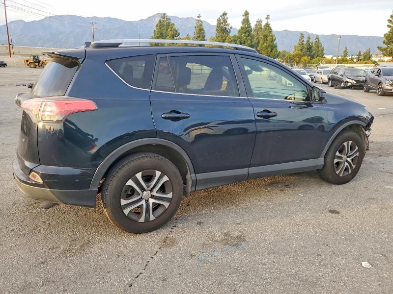 Photo 3 from auction – 2018 TOYOTA RAV4 with VIN JTMZFREV9JJ724697