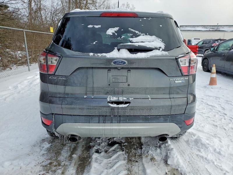 Photo 6 from auction – 2017 FORD ESCAPE TIT with VIN 1FMCU9JD7HUC08321
