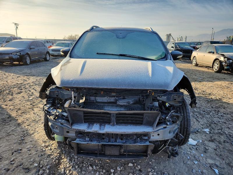 Photo 5 from auction – 2017 FORD ESCAPE TIT with VIN 1FMCU9J99HUC50291