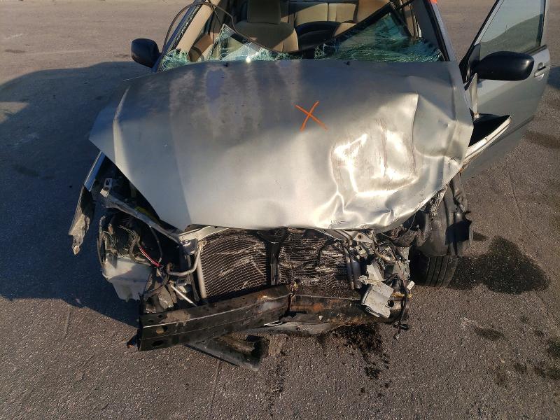 Photo 11 from auction – 2004 TOYOTA COROLLA with VIN 1NXBR32E24Z272052