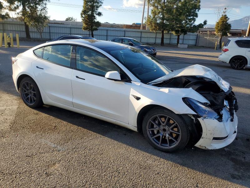 Photo 4 from auction – 2022 TESLA MODEL 3 with VIN 5YJ3E1EA3NF156211