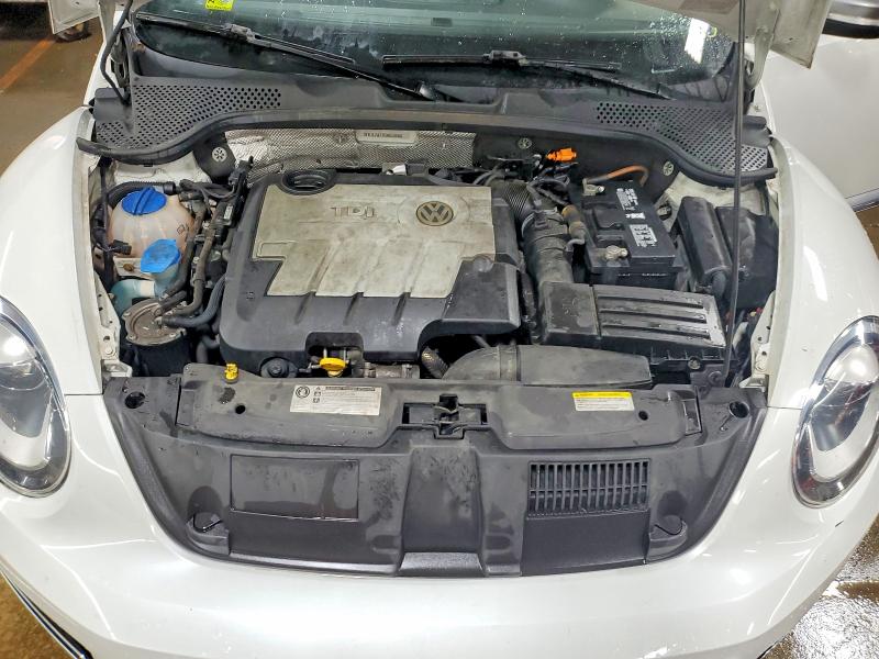 Photo 11 from auction – 2014 VOLKSWAGEN BEETLE with VIN 3VWJL7AT1EM653693