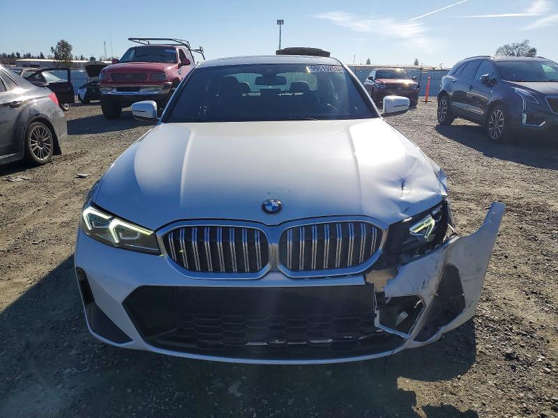 Photo 5 from auction – 2023 BMW 330XI with VIN 3MW89FF05P8C84600