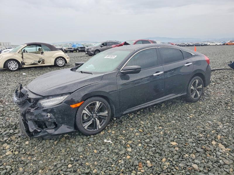 HONDA CIVIC TOUR 2017 with VIN 19XFC1F96HE212529 - Photo from auction