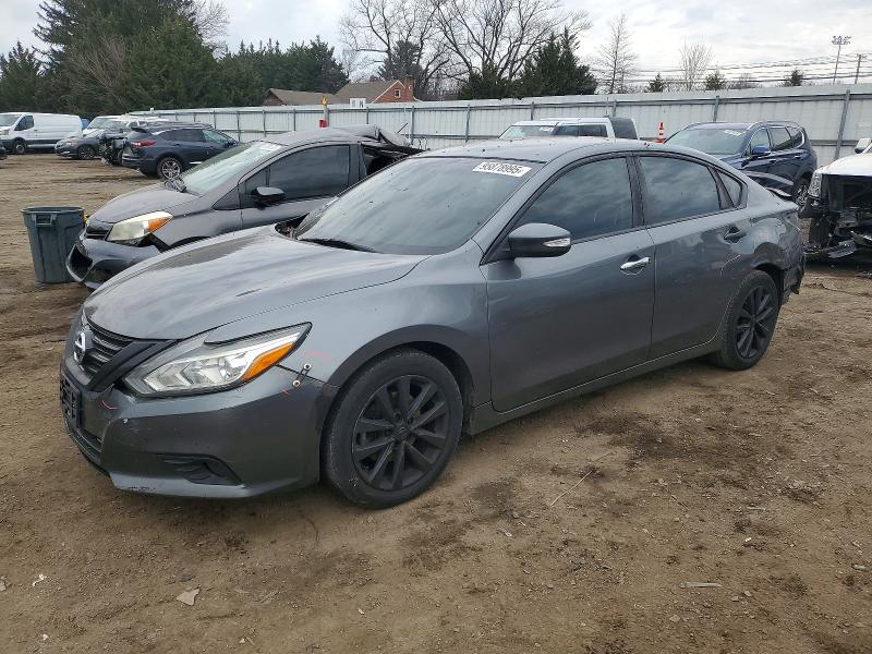 NISSAN ALTIMA 2.5 2017 with VIN 1N4AL3AP8HC184418 - Photo from auction