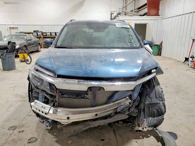 Photo 5 from auction – 2021 HONDA PILOT SE with VIN 5FNYF6H25MB026966