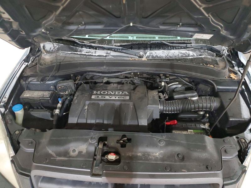 Photo 12 from auction – 2005 HONDA PILOT EX with VIN 5FNYF18465B015190
