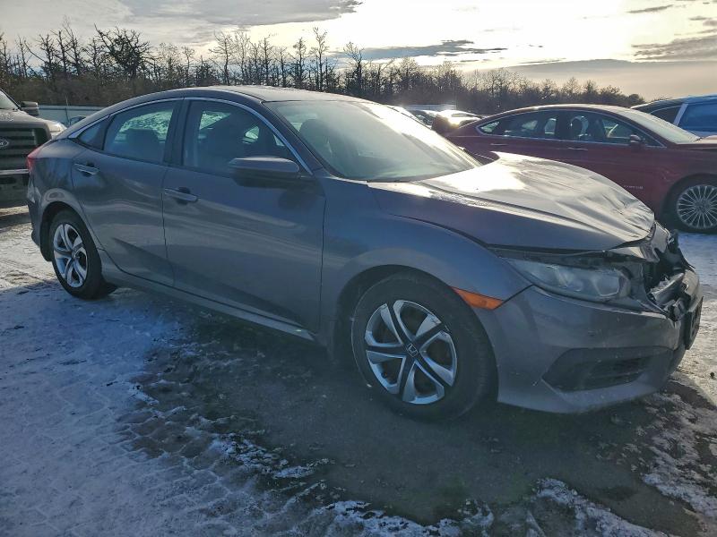 Photo 4 from auction – 2018 HONDA CIVIC LX with VIN 2HGFC2F55JH544864