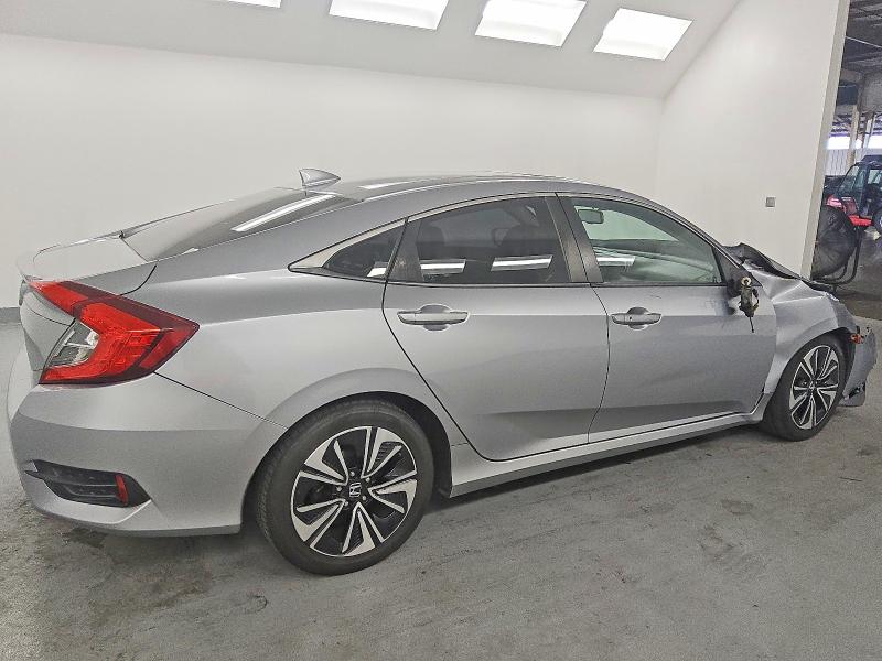 Photo 3 from auction – 2016 HONDA CIVIC with VIN 2HGFC1F77GH642475