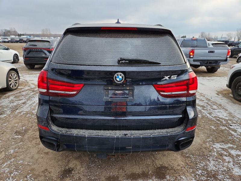 Photo 6 from auction – 2014 BMW X5 XDRIVE5 with VIN 5UXKR6C53E0C02171
