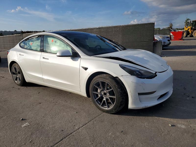 Photo 4 from auction – 2023 TESLA MODEL 3 with VIN 5YJ3E1EA4PF590334